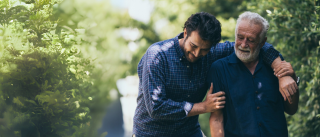 Man walking with elderly Father