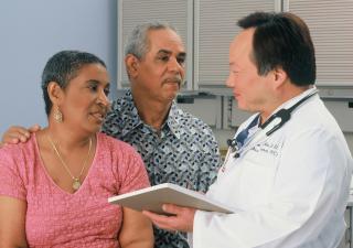 Doctor meeting with family