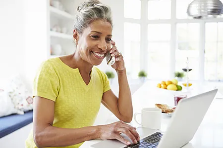 woman-on-phone-and-laptop.jpg