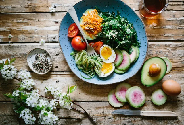 Healthy meal with fruit, vegetables, and eggs