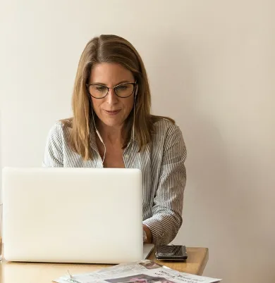 white woman on laptop