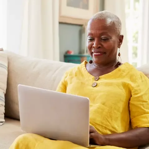 Woman taking survey on computer
