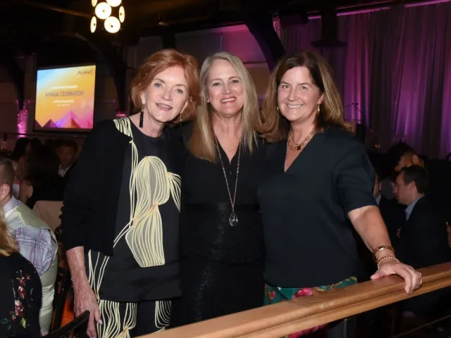 CEO Debbie Weir poses with Barbara Bradley Baekgaard (left) and Joanie Hall (right) at CSC's Annual Celebration.
