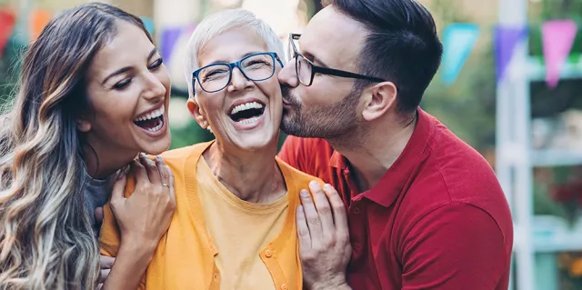 older lady with happy family members