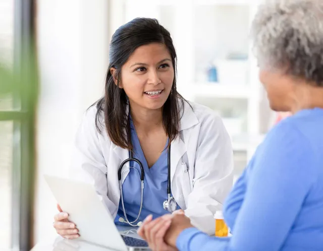 Female doctor consulting her patient