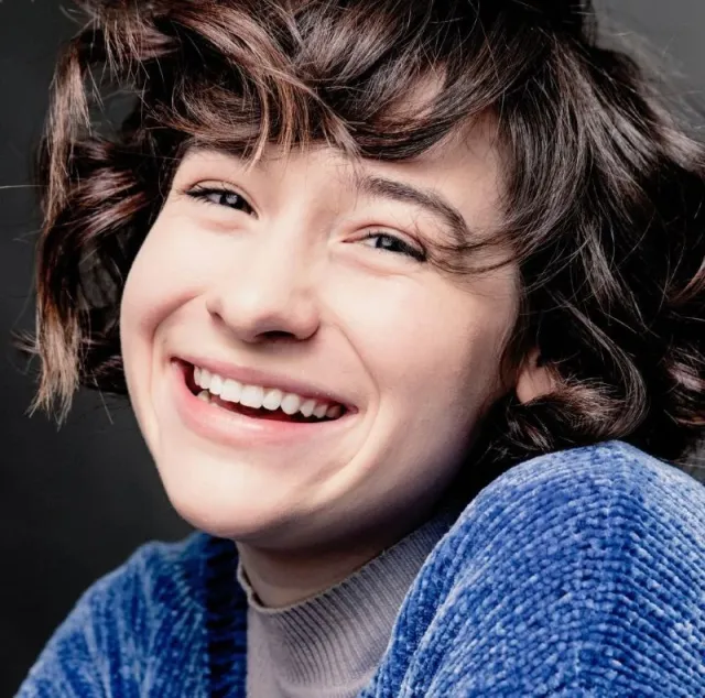 Pictured: Courtney smiling