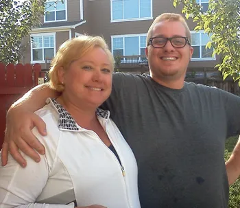 Chef Ryan and his mom smile for a photo