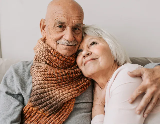 Old couple hugging