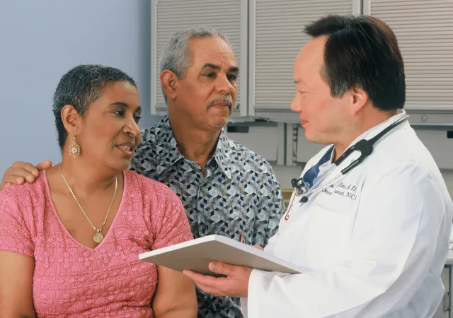 Doctor meeting with family