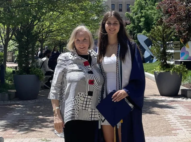 Meghan and her grandmother, Paula, smile for a photo