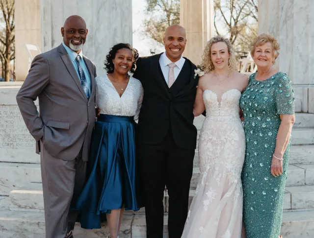 Brandon and Jackie on their wedding day with family
