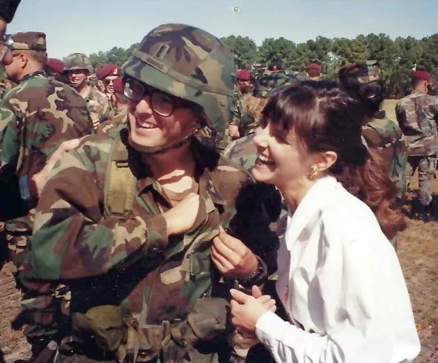 Tim with his wife Michele, pictured at Fort Bragg at Tim&rsquo;s completion of the U.S. Army Expert Field Medical Badge.