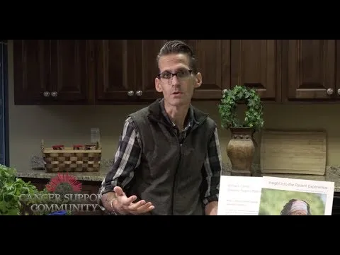 white man in glasses speaking with CSC logo on the bottom left 