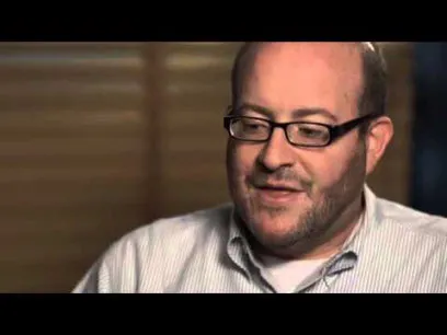 white man with glasses talking about living with metastatic melanoma