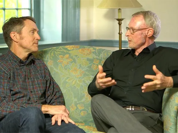 two white men on a couch discussing self advocacy