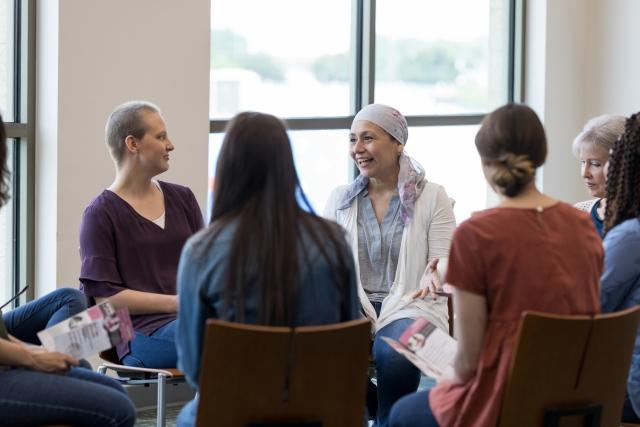 Women in a support group circle