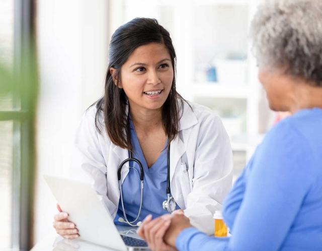 Female doctor consulting her patient
