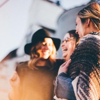 3 friends laughing