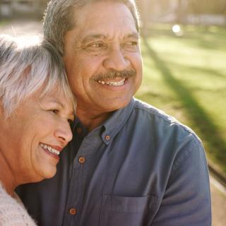 Older couple embracing 