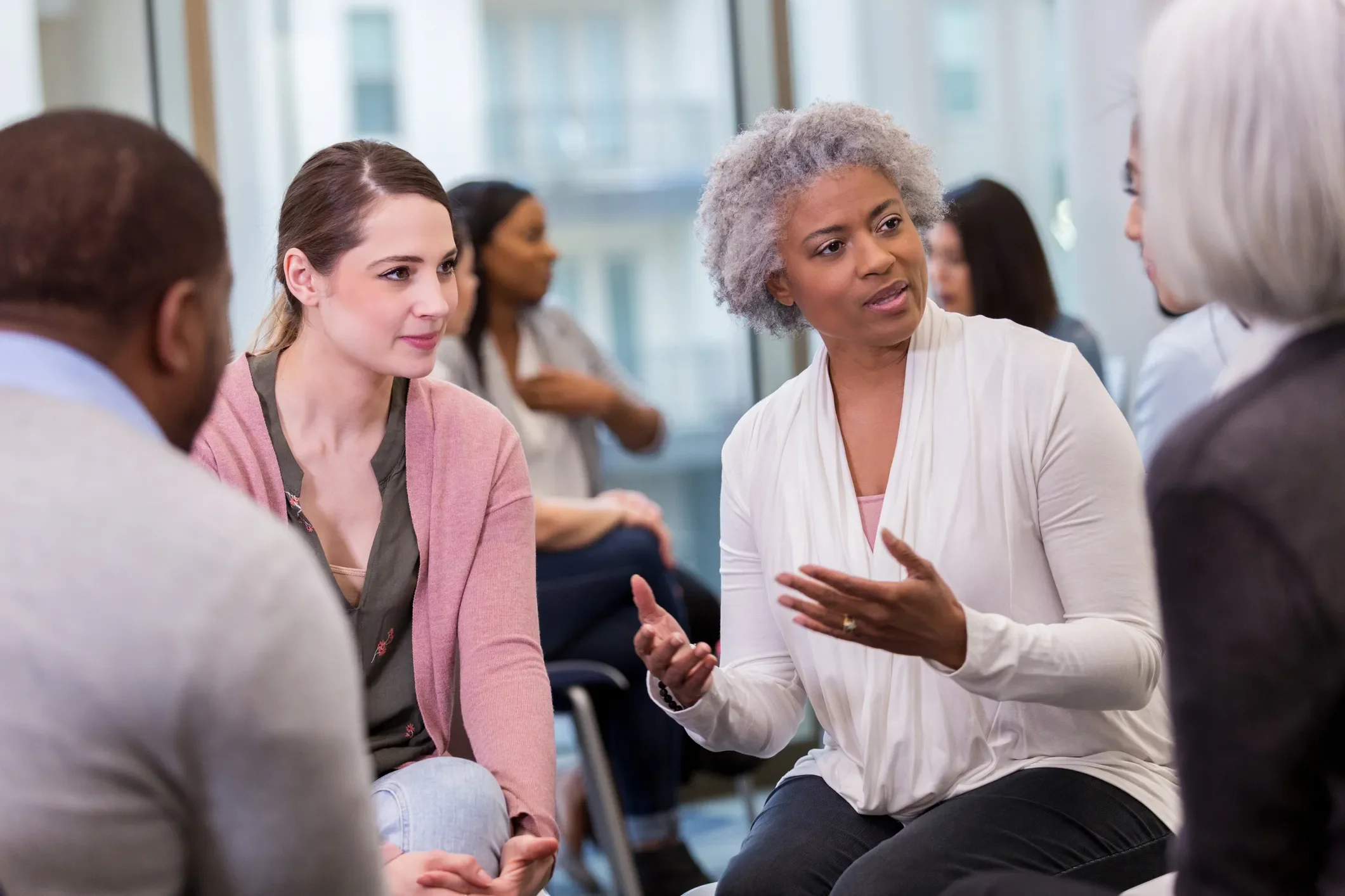 a mature woman shares in a support group