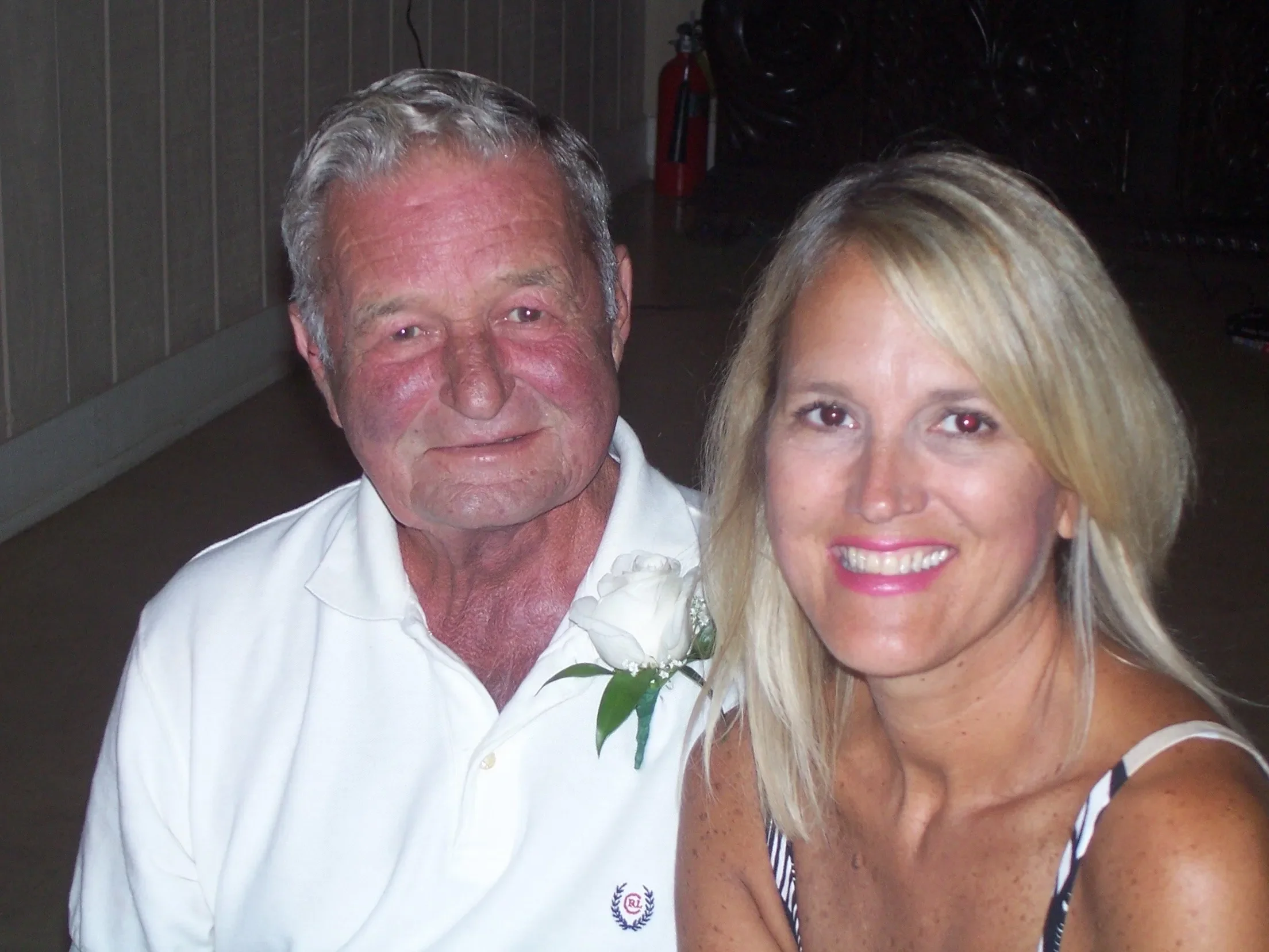 Debbie with her father at a family event.