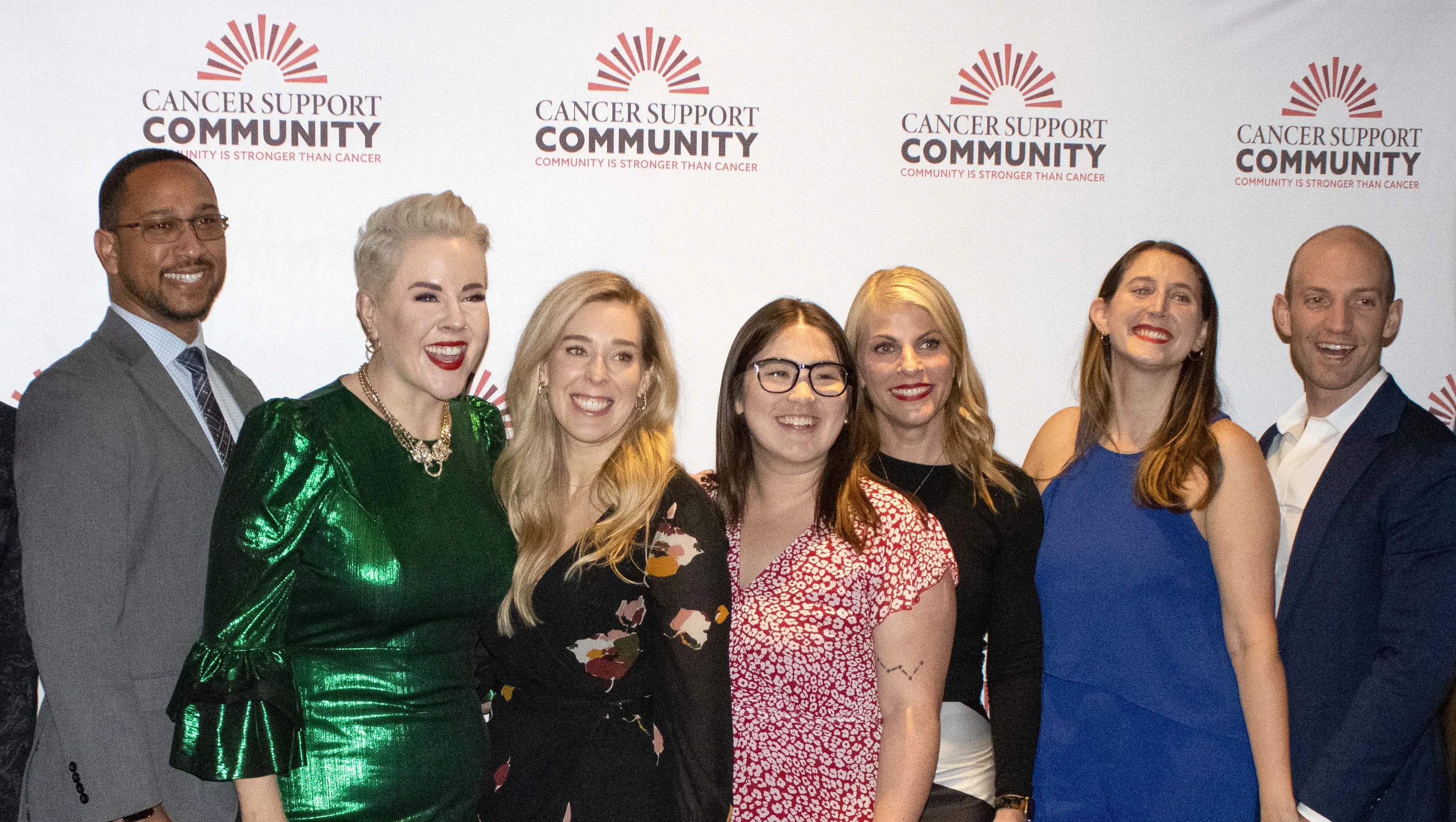 CSC staff smiling at an event