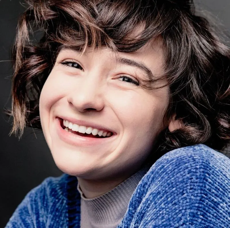 Pictured: Courtney smiling