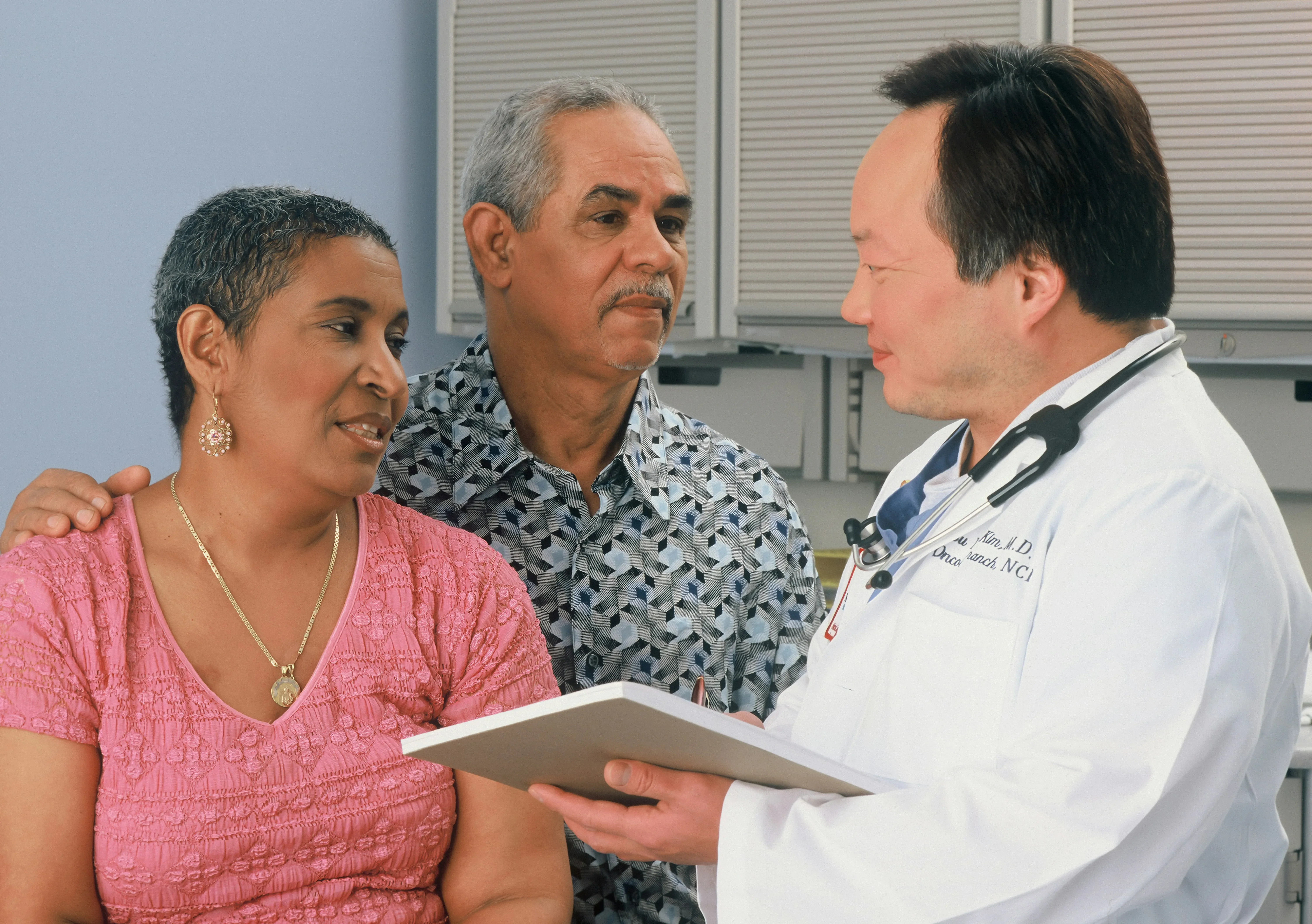Doctor meeting with family