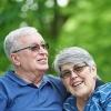 older white couple embracing outside