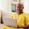 Woman typing on computer