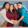 joe and his family smiling