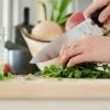 woman chopping vegetables in the kitchen