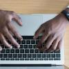 man using a laptop