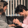 Gildna Radner laughs with a friend