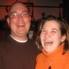 Justin and Kelly laugh together during an evening out with friends in 2008